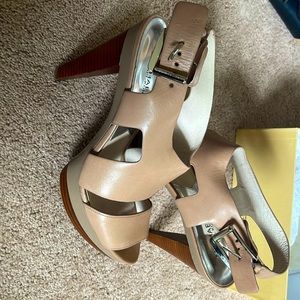 Brand new Michael Kors Carla Platform in color taupe